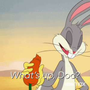 Bugs Bunny holding a munched carrot and saying "What's up, Doc?"